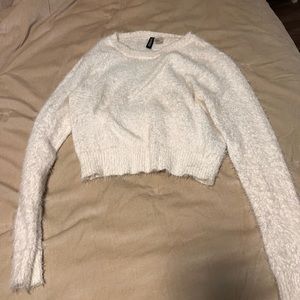 Fuzzy white cropped divided sweater